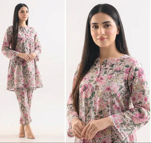 Woman modeling a floral outfit on a white background