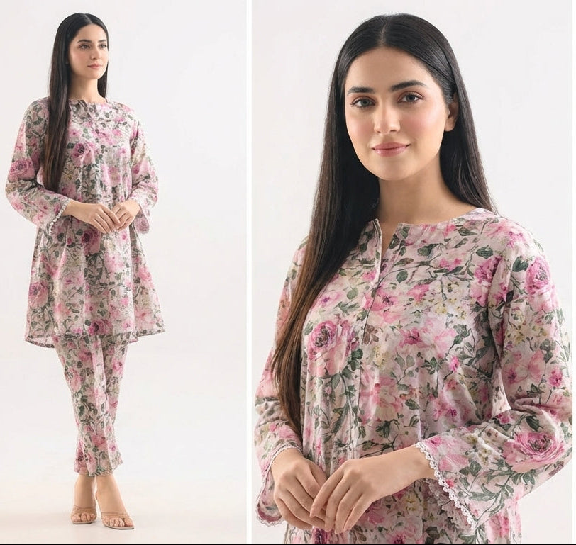 Woman modeling a floral outfit on a white background
