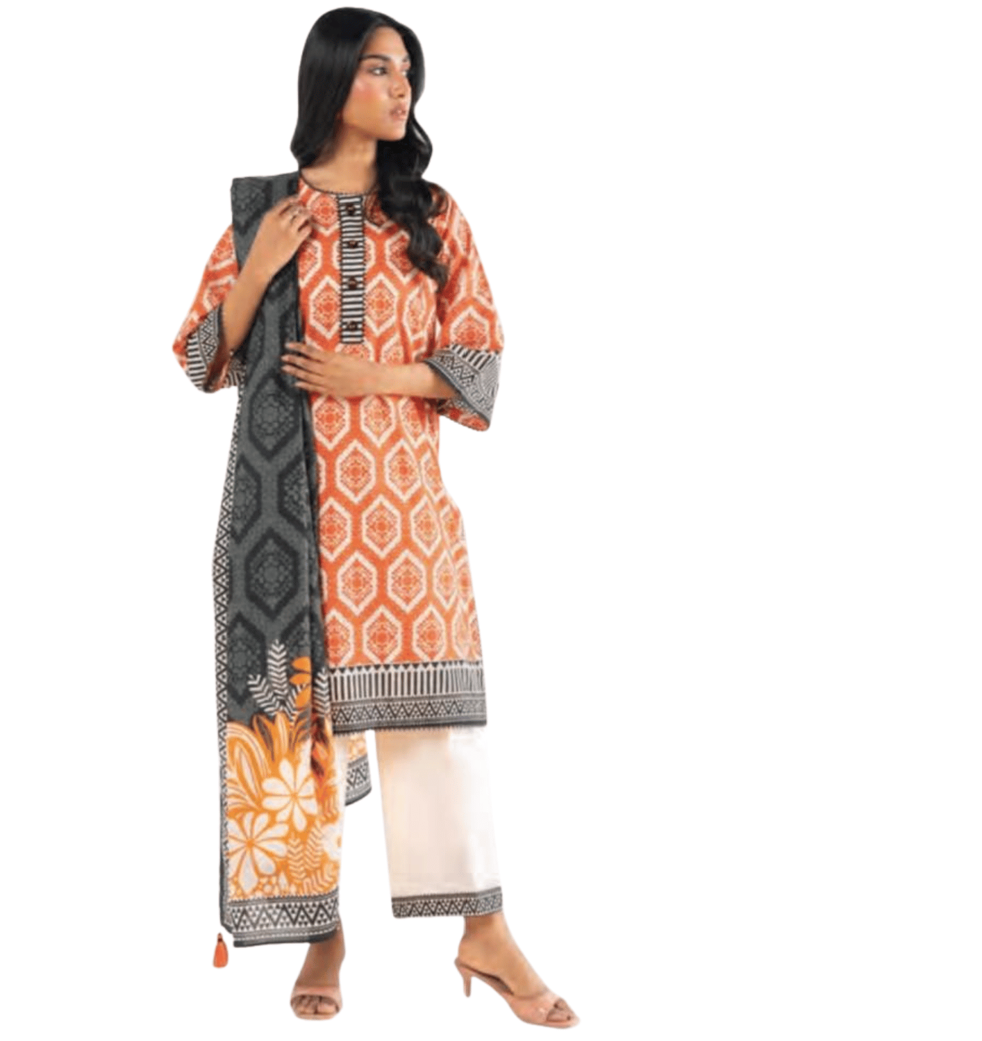 Woman wearing a patterned kurta with a plain white background