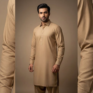 Man wearing a beige kurta with pants against a brown background