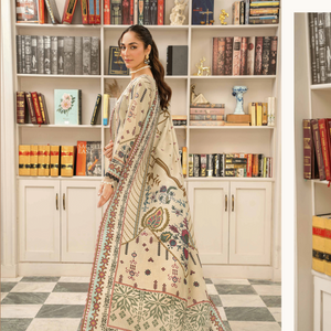 Woman in a traditional outfit standing in front of a bookshelf.