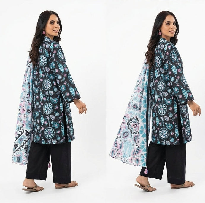 Woman wearing a floral patterned outfit with black pants on a white background