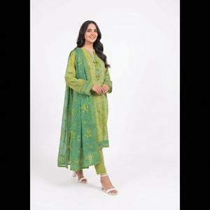 Woman wearing a green traditional outfit on a white background