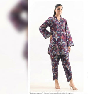 Woman wearing a floral patterned outfit on a white background