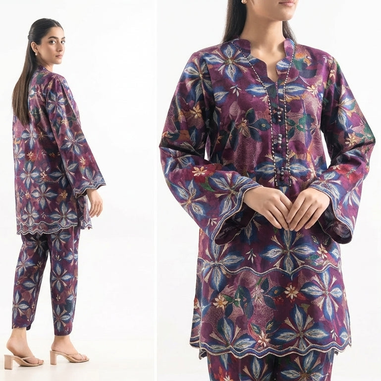 Floral patterned pajama set worn by a model on a white background