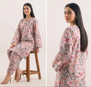 Woman modeling a floral pajama set in three different poses against a white background.