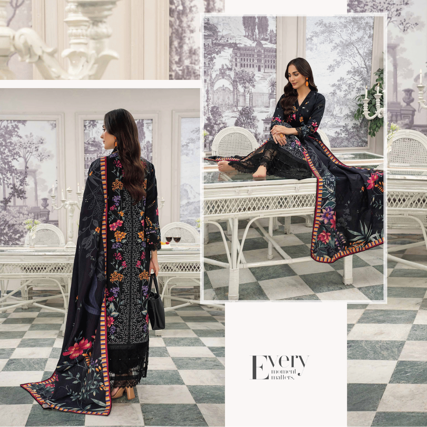 Woman in a black saree with floral patterns in a room with white furniture and large windows.