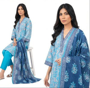 Woman wearing a blue floral traditional outfit on a white background