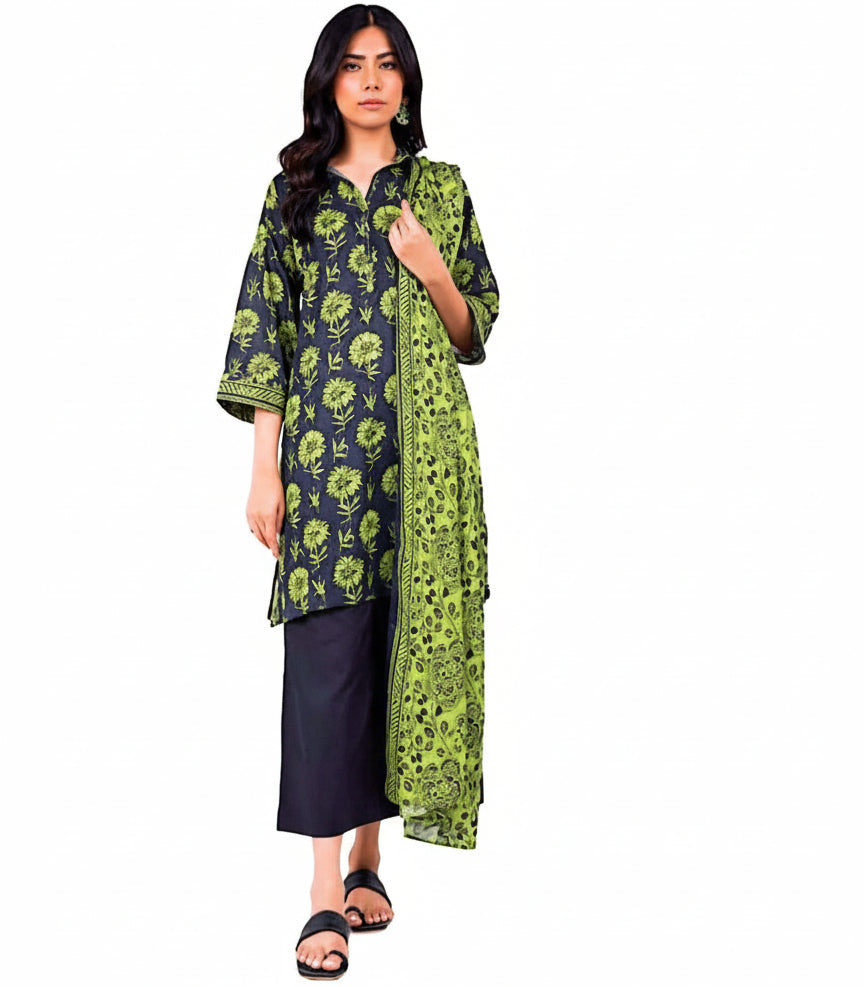 Woman wearing a green floral dress with a black dupatta by Alkaram on a white background