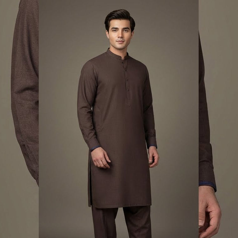 Man wearing a brown kurta with a plain background