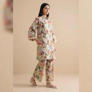 Woman wearing a floral outfit on a beige background