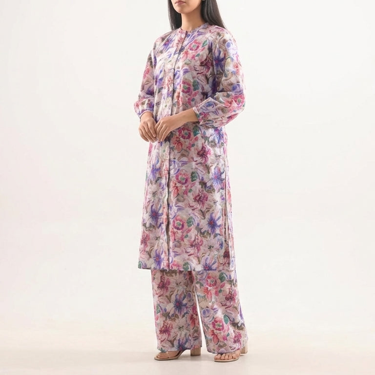 Woman wearing a floral outfit on a white background