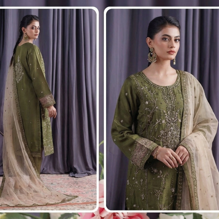 Woman in a green embroidered outfit with beige dupatta against a purple curtain background