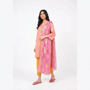 Woman wearing a pink traditional outfit with a white background