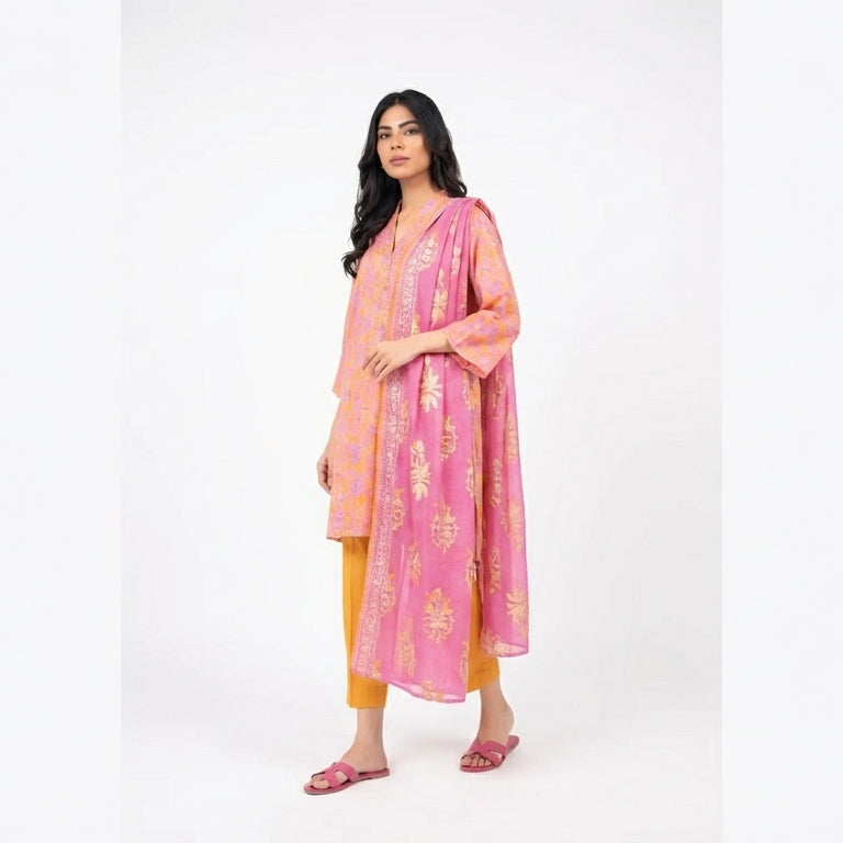 Woman wearing a pink traditional outfit with a white background