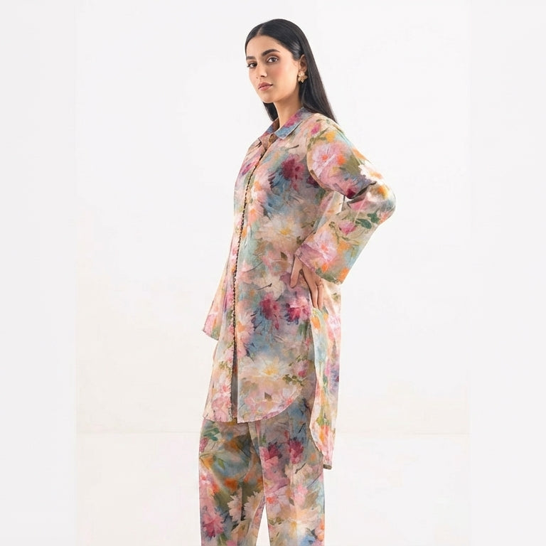 Woman wearing a floral outfit on a white background