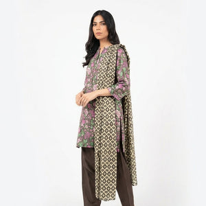 Woman wearing a patterned outfit on a white background